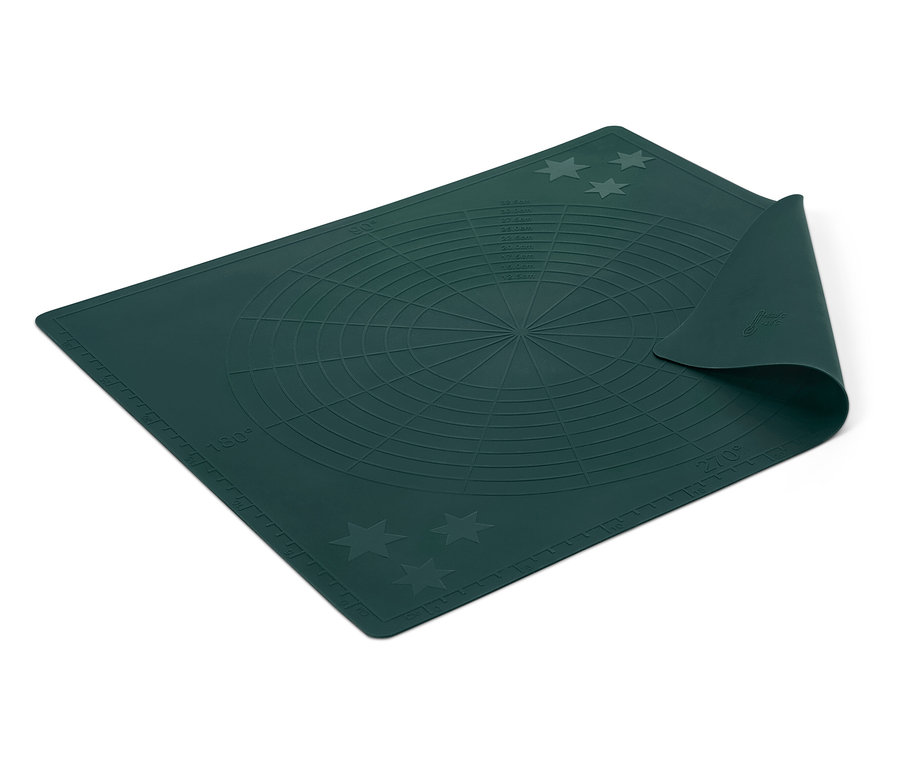 Tapis de cuisson vert en silicone avec des guides circulaires et des étoiles.