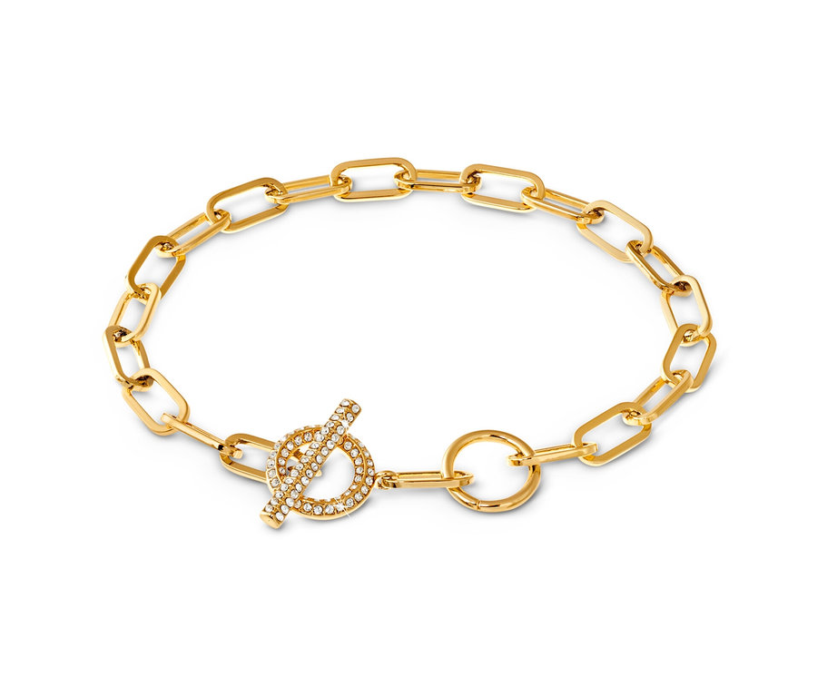 Bracelet Toggle doré avec insert de cristaux sur fond blanc.