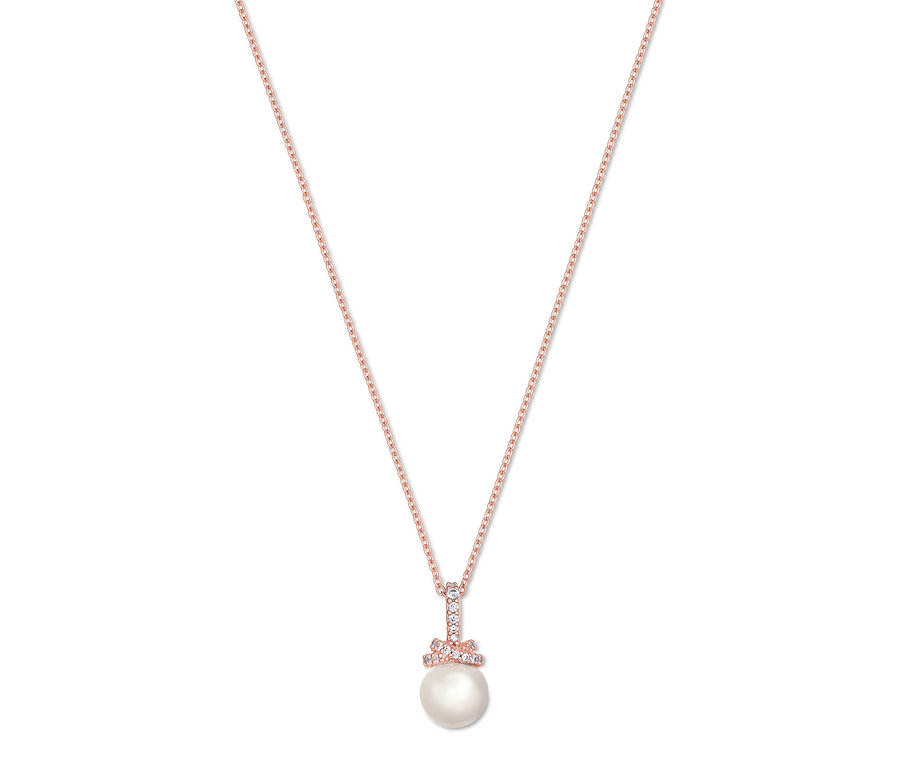 Détail d'un collier rose doré avec perle et nœud.