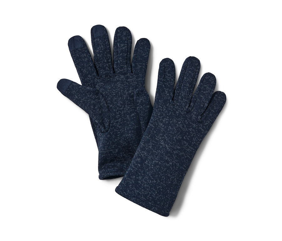 Deux gants en matière polaire tricotée bleu foncé sont posés l'un à côté de l'autre.
