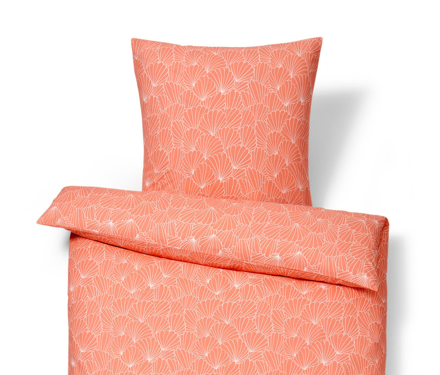 Parure de lit en renforcé orange à motif floral blanc, taille normale, avec oreiller.