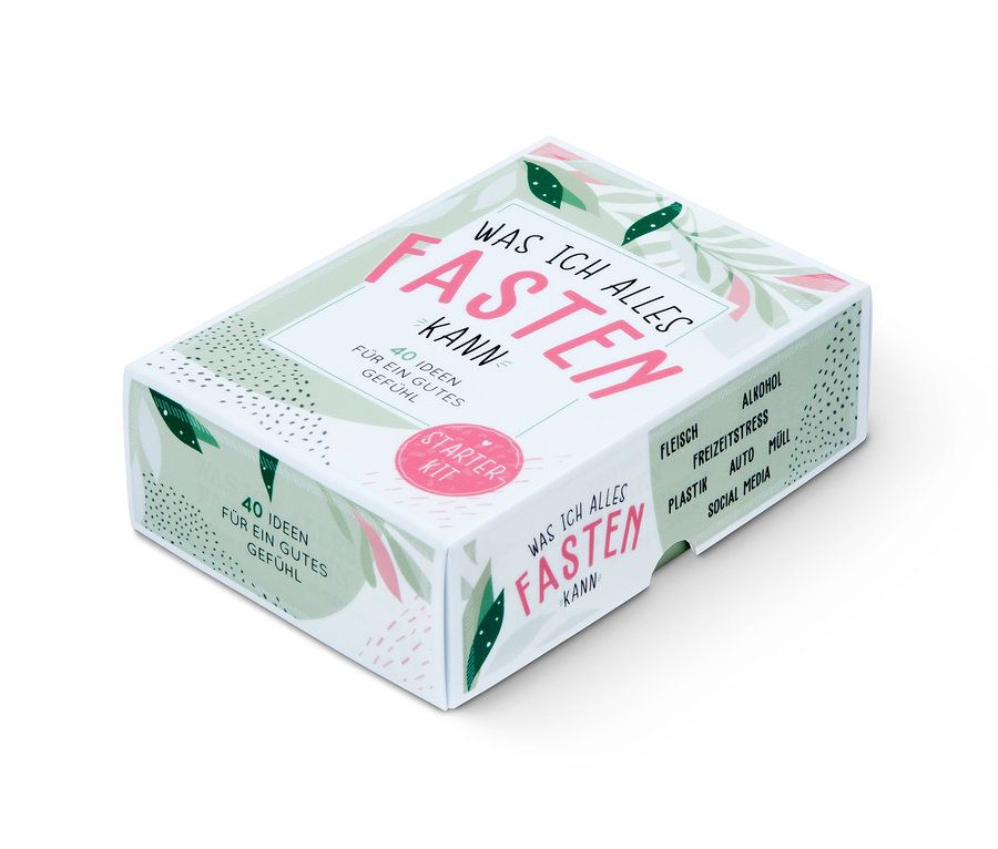 Une boîte blanche du kit de démarrage Fasten : «
bspWas ich alles fasten kann
bsp» avec une inscription rose.