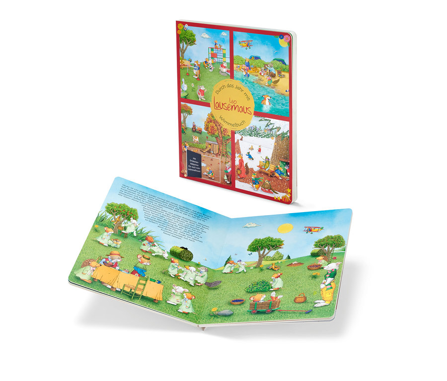 Un livre pour enfants ouvert, Wimmelbuch : Durch das Jahr mit Leo Lausemaus, présente des illustrations de souris dans un pré.