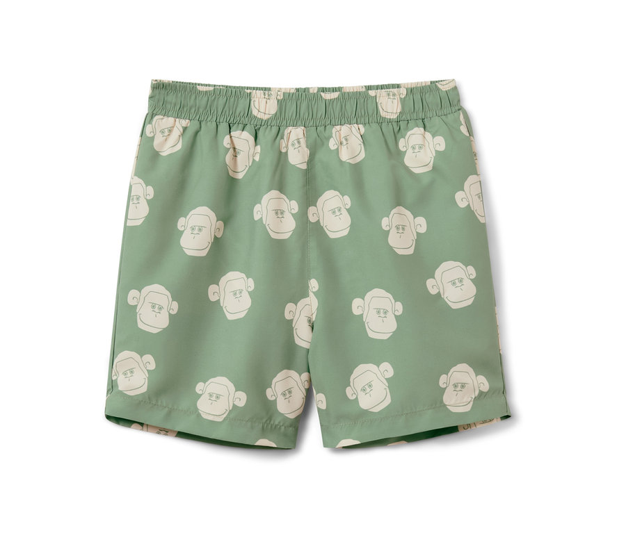 Boardshort pour enfant vert avec motif de singes.