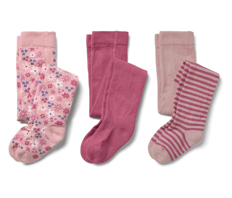 Trois paires de collants pour enfants : rose à motif floral, rose uni et rose rayé.