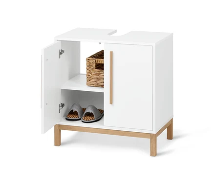 Un meuble sous vasque « Eklund » blanc ouvert avec un panier et des chaussons à l'intérieur.