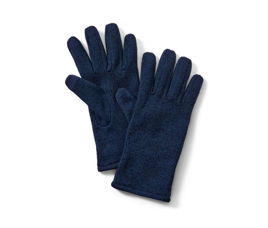 Deux gants bleus en matière polaire tricotée sont posés l'un sur l'autre.