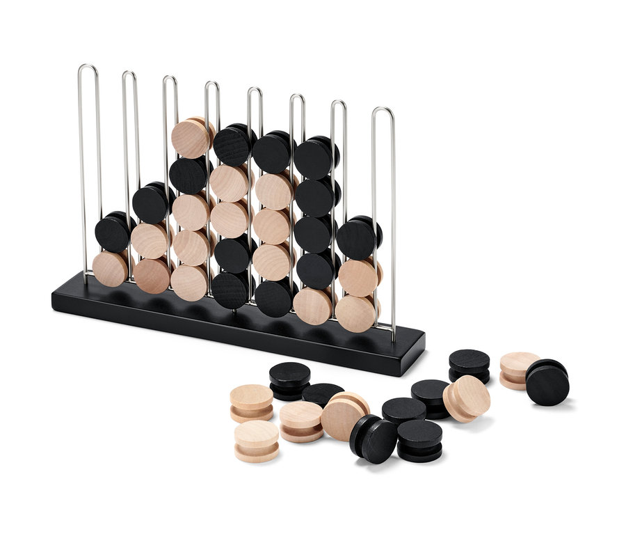 Jeu de table « 4 en ligne » avec des pions noirs et en bois.