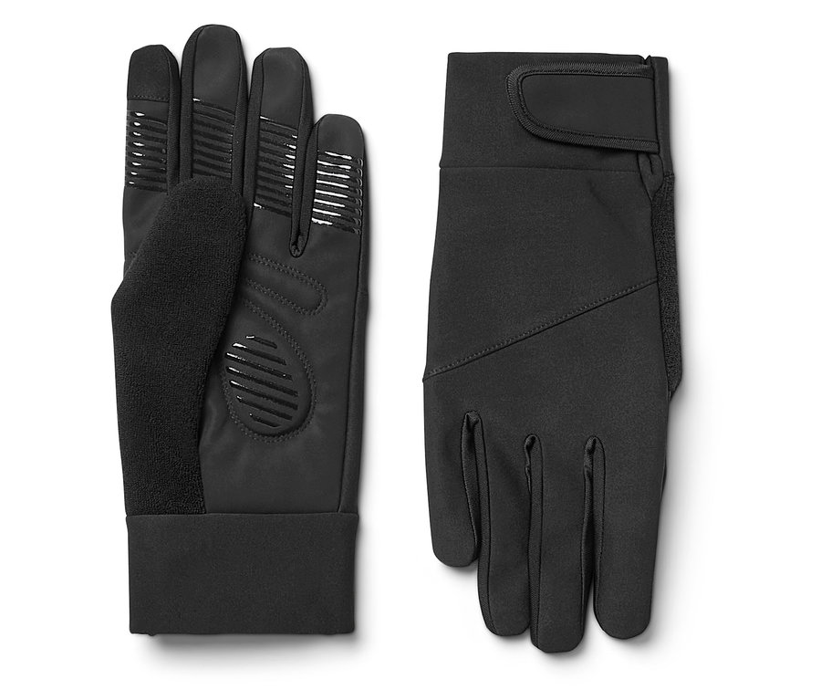 Deux gants noirs sont posés côte à côte. L'un est posé sur le dos et l'autre sur la paume.