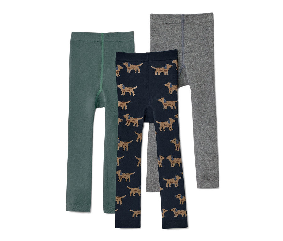 Trois leggings thermiques pour enfant : un vert, un bleu marine à motif de teckels et un gris.