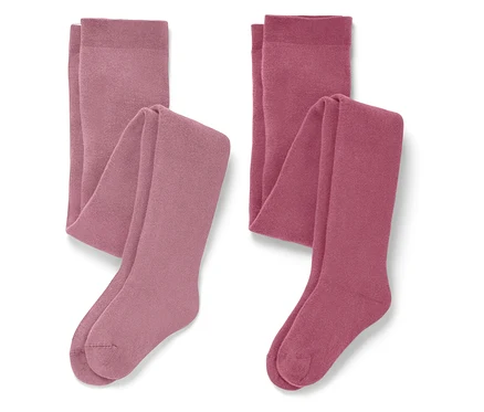 Deux paires de collants pliés dans des tons roses.