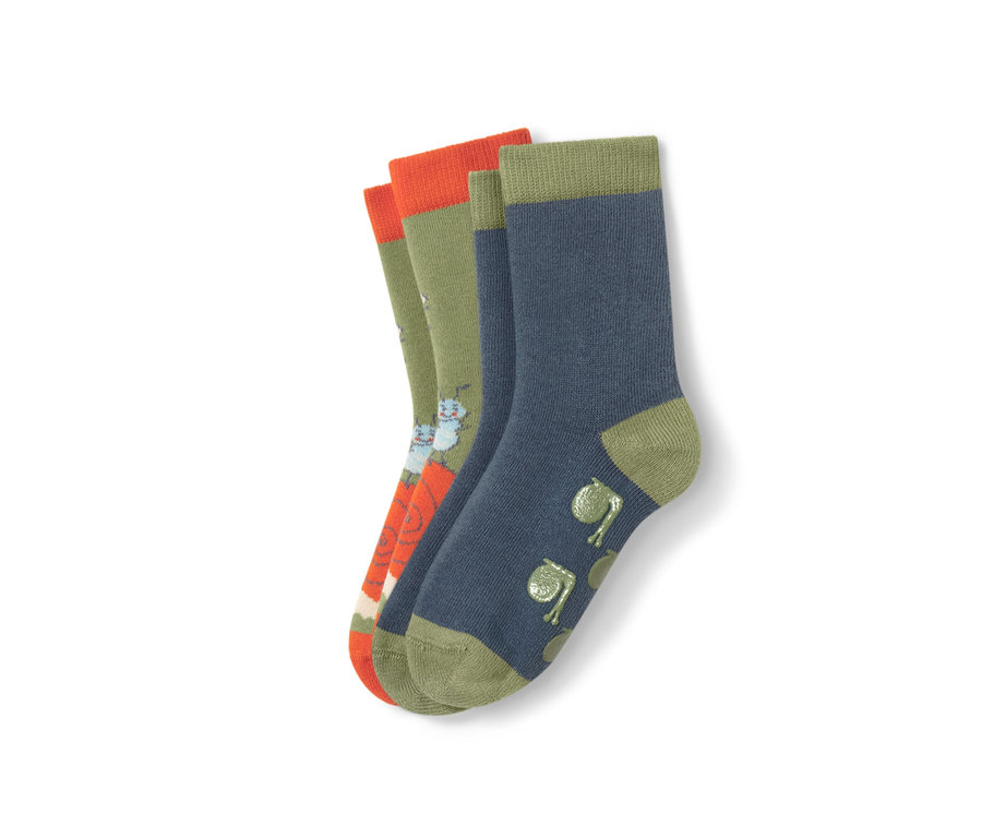 Deux paires de chaussettes anti-dérapantes pour enfants.