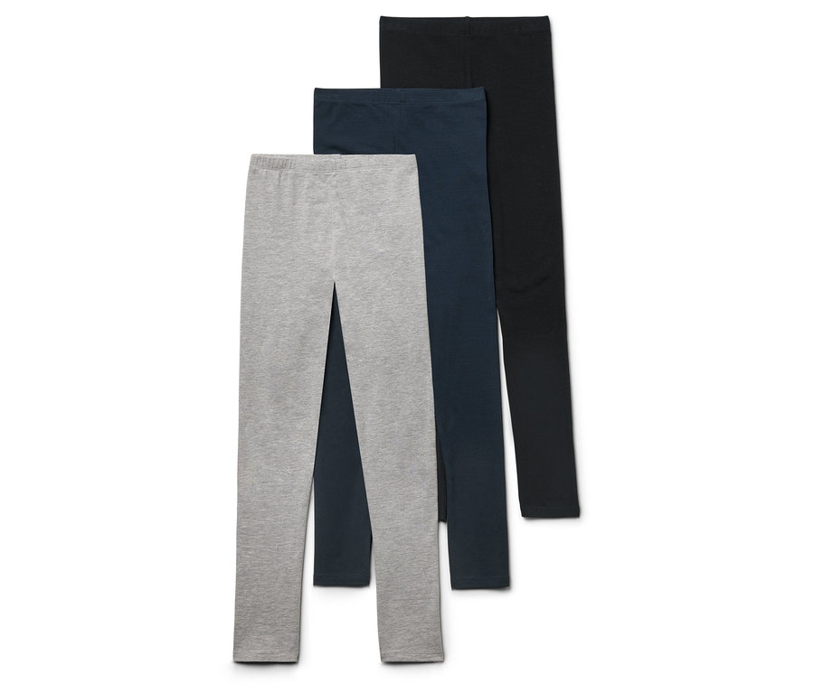 Trois paires de leggings : gris, bleu marine et noir.