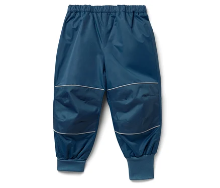 Pantalon bleu pour enfants avec détails réfléchissants sur les genoux.